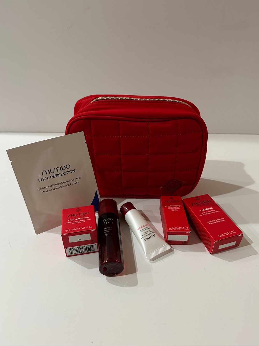 NWOT Shiseido Red Quilted Cosmetic Case with Mini Skincare Set